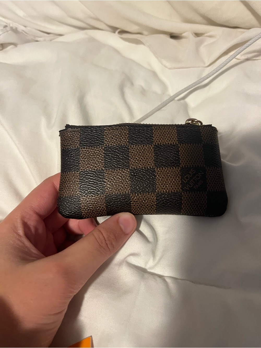 Louis Vuitton brown and black checkered key case with original packaging